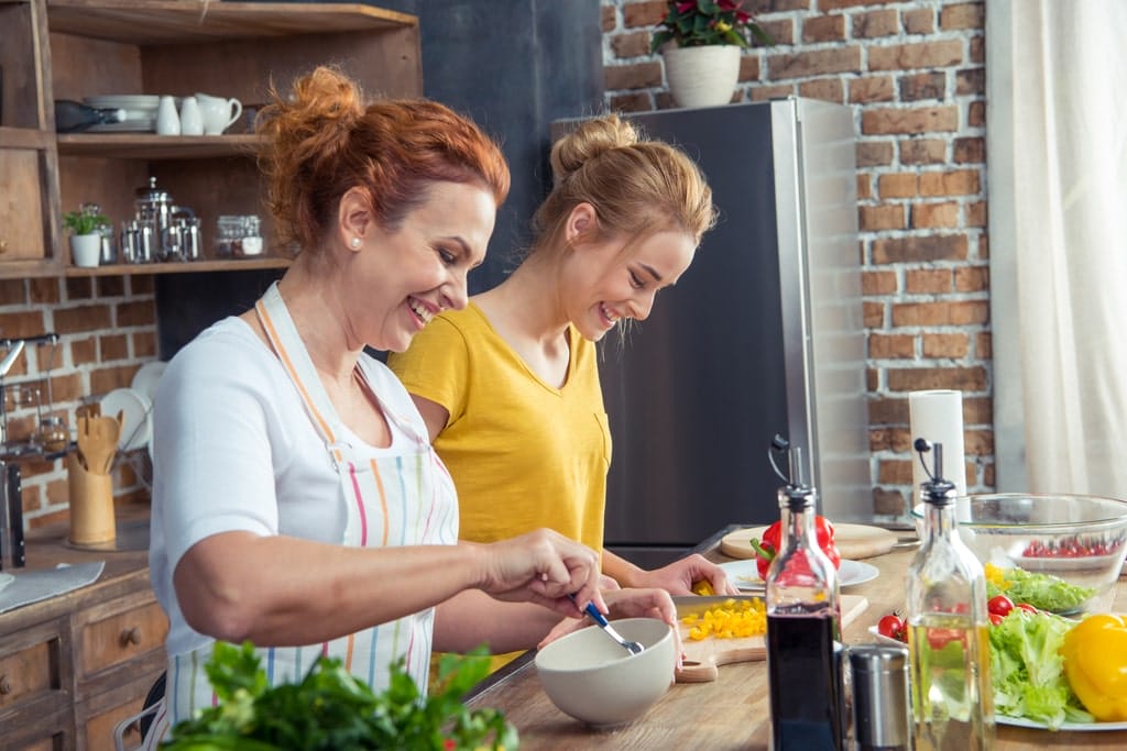 Mother and Daughter Cooking Together